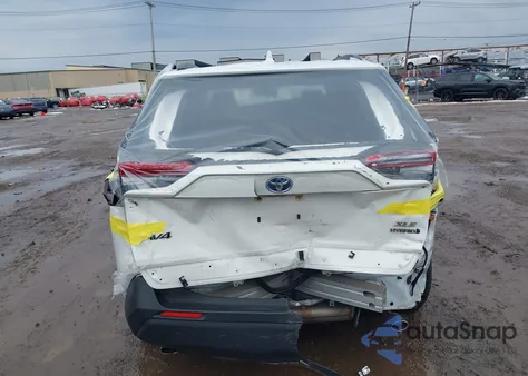 2021 Toyota Rav4 Hybrid Xle from USA, damaged, VIN JTMRWRFV9MD101145